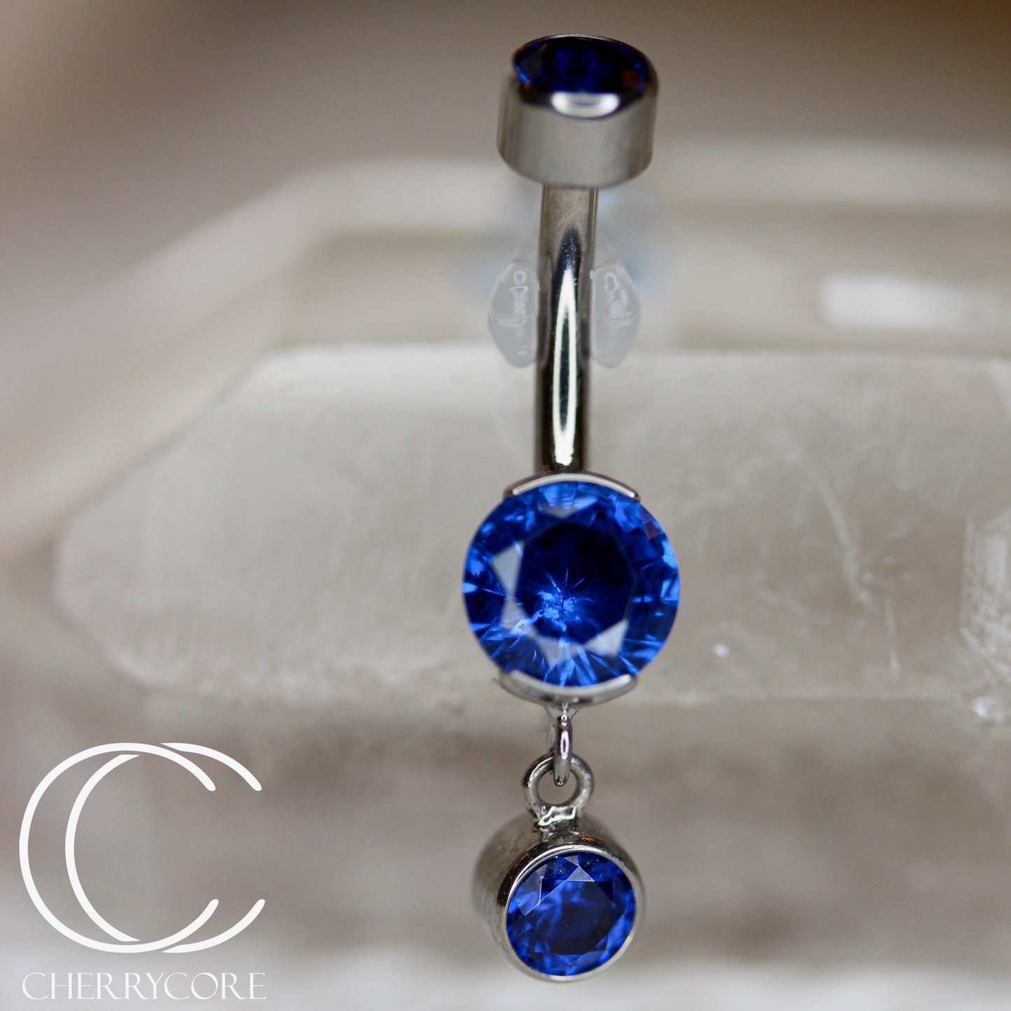 Titanium Partial Bezel Sapphire CZ- Navel Curve w/ Dangle