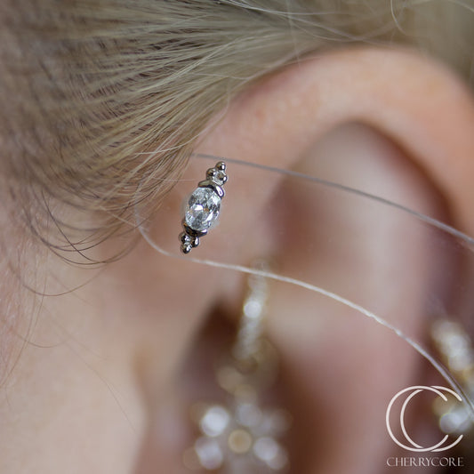14k White gold- Partial Bezel Set Oval CZ with Tribead accents- Threadless attachment