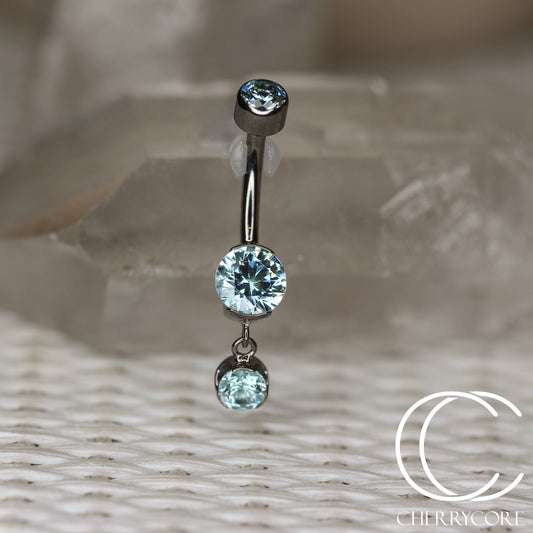 Titanium Partial Bezel Navel Curve w/ Dangle- Pistachio CZ