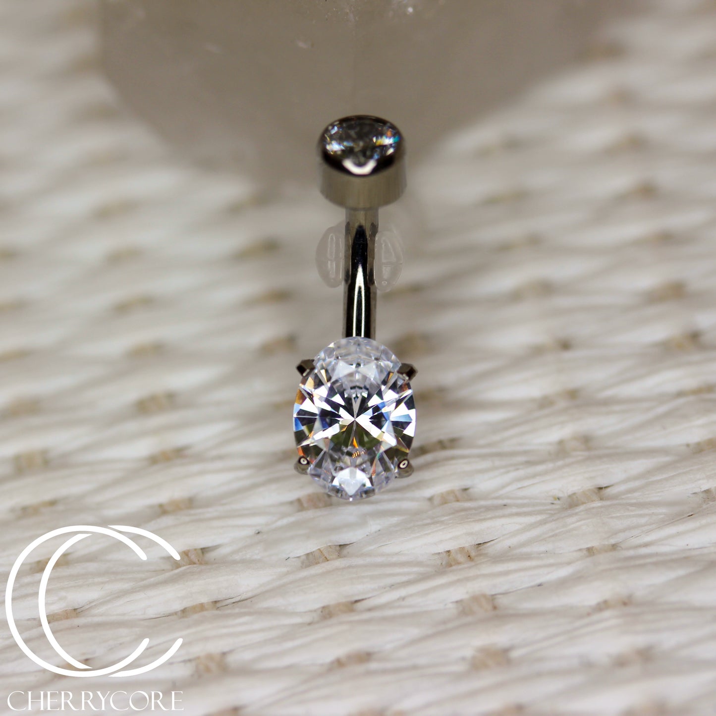Titanium Oval Cut Navel Curve - Cz