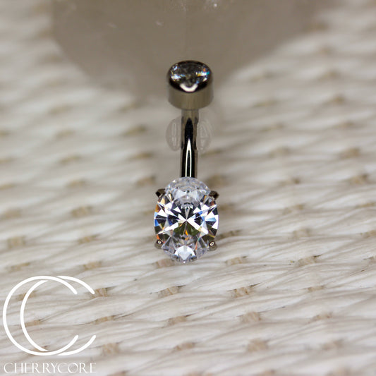 Titanium Oval Cut Navel Curve - Cz