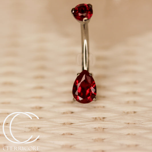 Titanium Prong Set Ruby CZ Pear Gem Navel Curve