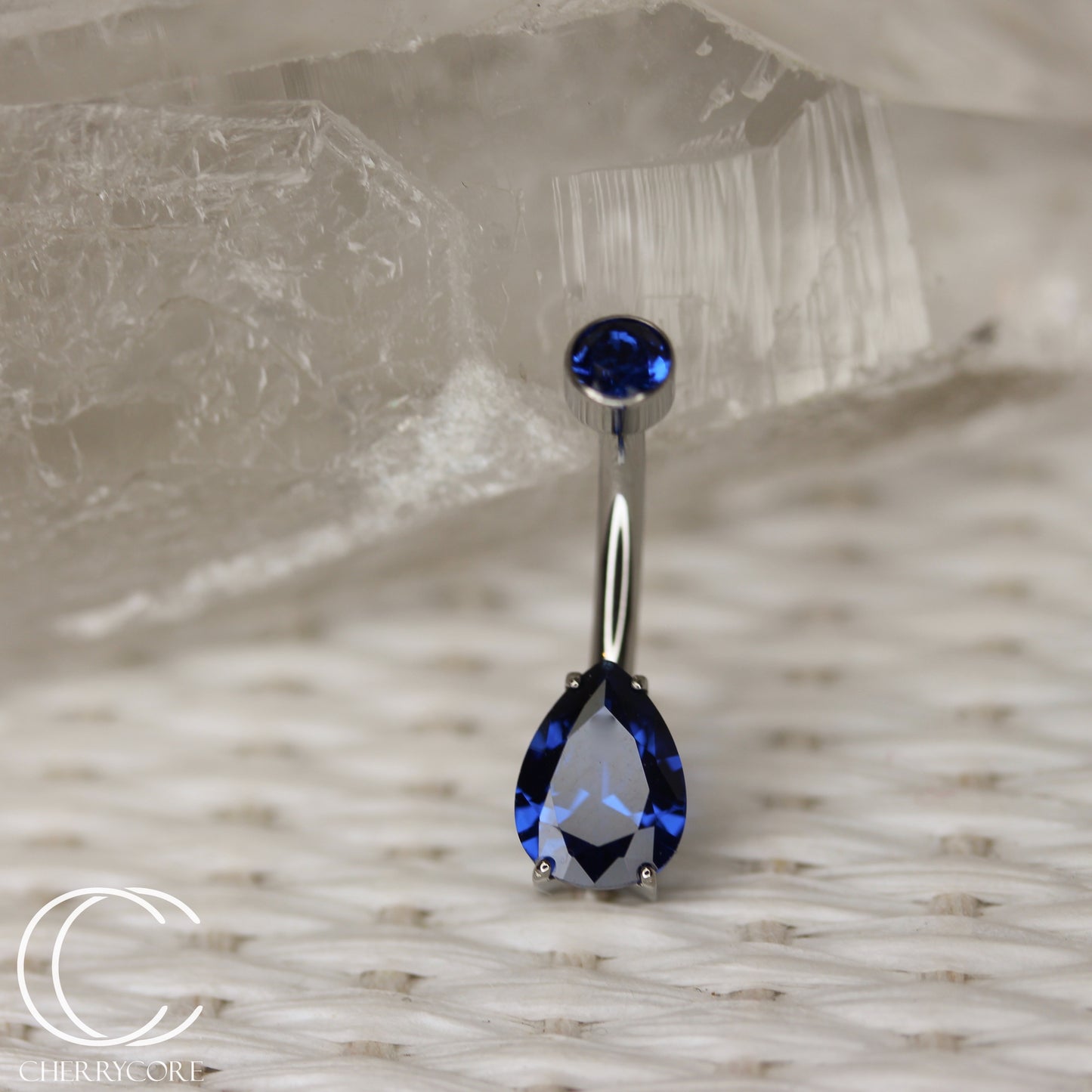 Titanium Prong Set Pear & Bezel - Sapphire CZ - Navel Curve